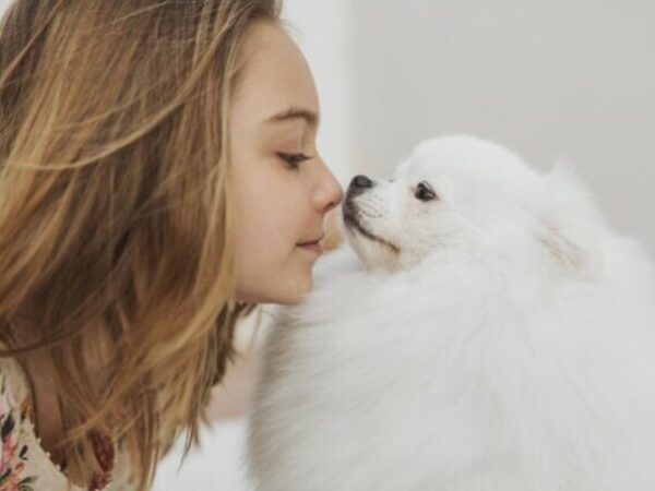 girl-dog-touching-noses